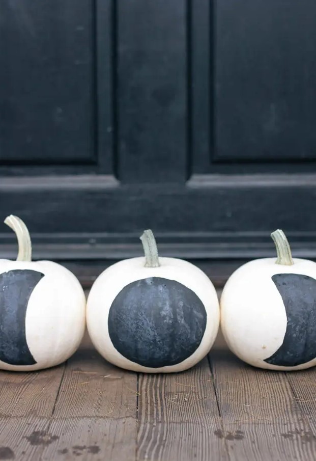 simple DIY black and white moon phase pumpkins are amazing for modern Halloween or fall decor, and they will be great for constellation decor