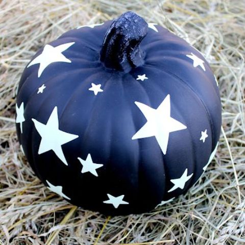 a midnight blue glow int he dark pumpkin with stars is a beautiful idea for Halloween, great for kids' parties