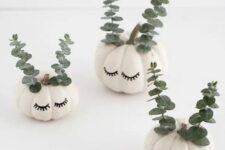 15 beautiful and cute white pumpkins with sharpie eyelashes and eucalyptus will be a cool and lovely idea for the fall and Halloween