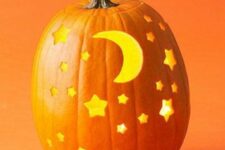 16 a bright orange pumpkin luminary with cutout stars and moons is a lovely idea for Halloween