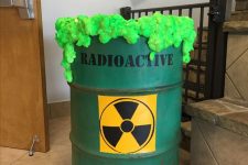 20 a green barrel with neon green radioactive waste is a gorgeous Halloween decoration that you can easily DIY