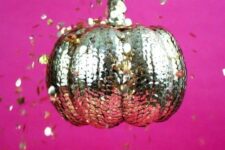 22 a lovely gold sequin pumpkin is a fantastic decor idea for a Halloween party, it looks wow