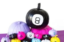 29 colorful and neon pumpkins with various decor and letters for a bright Halloween party