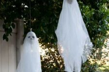 31 hanging ghosts with skulls are nice decorations for indoors and outdoors and can be made very fast
