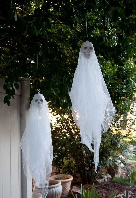hanging ghosts with skulls are nice decorations for indoors and outdoors and can be made very fast