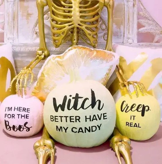 funny pastel pumpkins with phrases that rock are ideal for modern Halloween parties