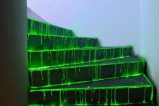 32 neon green drips covering the whole staircase and glowing in the dark will make your home bolder and scarier