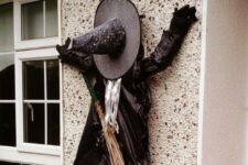 34 fun smashed witch decoration is a great idea for outdoor or a front door as if she was hurrying to your party
