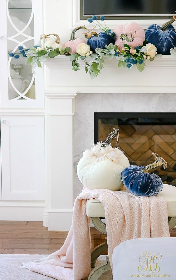 pink, navy and white fabric pumpkins and greenery are great to style your mantel for fall and Thanksgiving