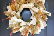 a cozy fall wreath with corn husks