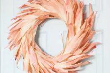 a bright dyed corn husk wreath is a bold and creative idea both for the fall and Thanksgiving and it looks amazing