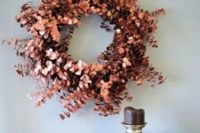 a copper eucalyptus wreath is a chic modern idea for fall and Thanksgiving and can be crafted easily