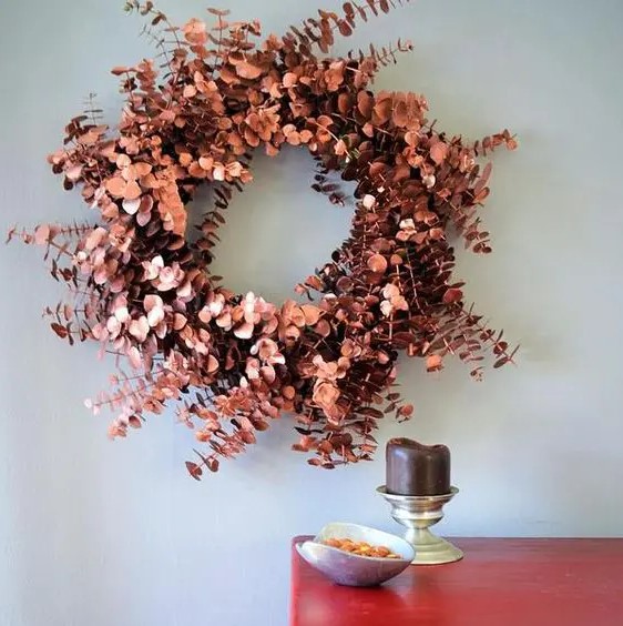 a copper eucalyptus wreath is a chic modern idea for fall and Thanksgiving and can be crafted easily