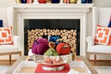 bright velvet pumpkins are a timeless solution for fall decor, they are long-lasting and will add color to the space