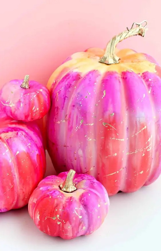 super colorful ombre pumpkins in red, pink and yellow and with gold splashes are fun and bright