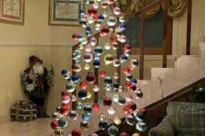 03 a bright floating Christmas tree composed of bold ornaments is a lovely idea for the holidays