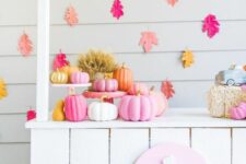 04 a bright Thanksgiving pumpkin stand with colorful garlands and banners, bright pumpkins in baskets and bright leaves