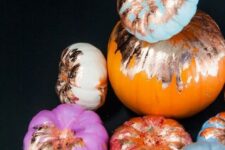 06 colorful pumpkins deocrated with gold foil are amazing for bright and fun fall or Thanksgiving decor
