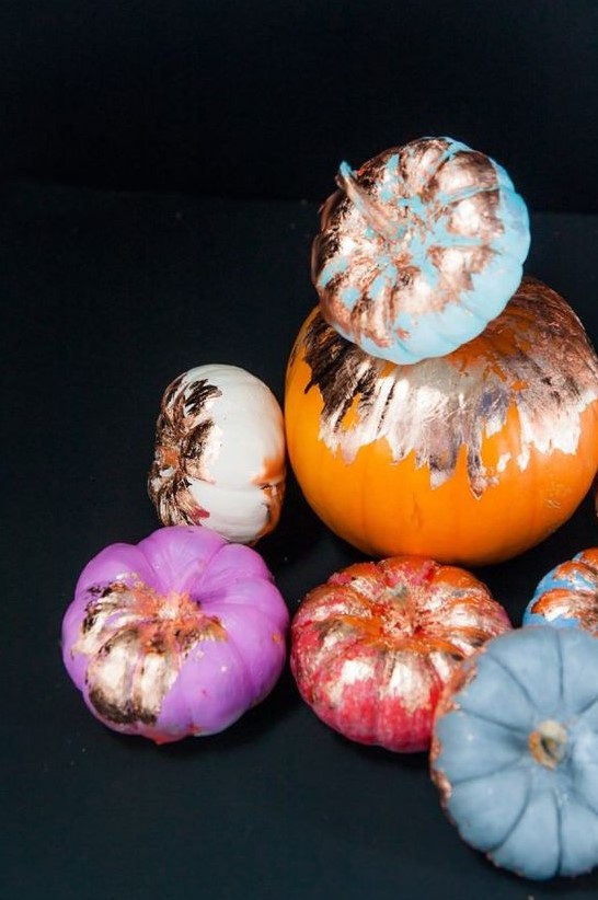 colorful pumpkins deocrated with gold foil are amazing for bright and fun fall or Thanksgiving decor