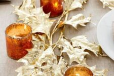 08 gold faux leaves and amber glass candleholders are great for styling a table for Thanksgiving