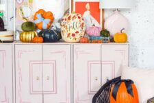 09 bold and beautiful fall pumpkins with painted blooms and leave,s in bold colors and with bows are amazing