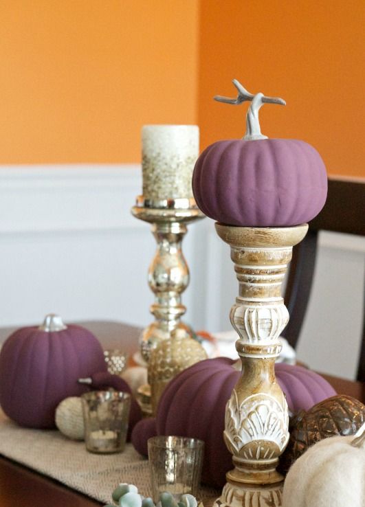 matte purple pumpkins on stands, mercury glass candleholders and candles with sparkles are amazing for fall