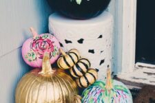 10 bright fall pumpkins – black with pink florals, pink, green, leopard, gold and black stripe ones – for fall porch decor