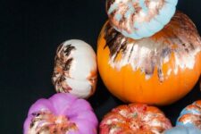 11 colorful pumpkins deocrated with gold foil are amazing for bright and fun fall or Thanksgiving decor