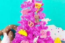 12 a hot pink Christmas tree decorated with junk food clay ornaments is a very bold color statement that inspired and strikes