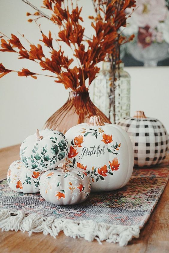 a gorgeous Thanksgiving pumpkin arrangement with botanical and floral patterns and stickers and a calligraphy floral pumpkin