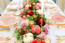 16 a bright and elegant Thanksgiving tablescape with white, blush, coral and burgundy velvet pumpkins, gold chargers and pink plates
