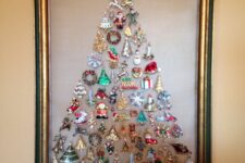 18 a Christmas tree wall art of vintage ornaments in a frame is a great solution for a vintage holiday space