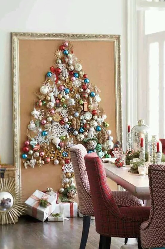 a large Christmas tree on canvas with a vintage frame is shaped only of colorful vintage ornaments for a chic look