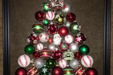 28 a vintage Christmas tree wall art of vintage ornaments in white, red, emerald and gold in a frame is amazing