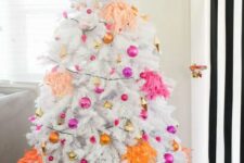 28 a white Christmas tree with hot pink, fuchsia, gold and orange ornaments and bright tassels is all about modern decor and bright colors