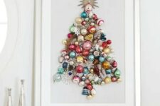 29 a beautiful colorful Christmas tree made of ornaments on a sign is a chic idea of an additional Christmas tree