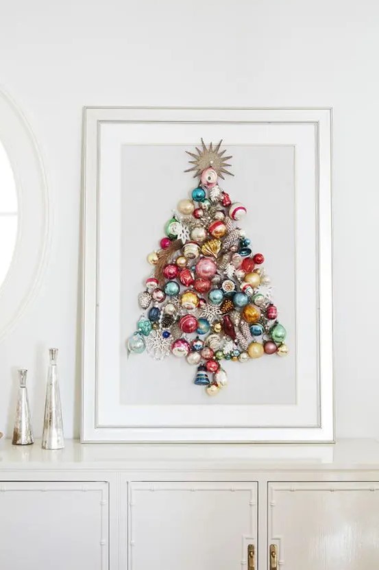 a beautiful colorful Christmas tree made of ornaments on a sign is a chic idea of an additional Christmas tree