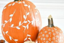 30 classic orange pumpkins with floral and botanical decor are a beautiful idea for the fall or Thanksgiving