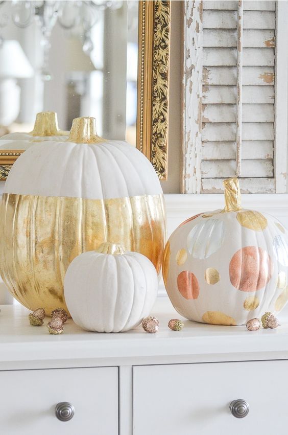 glam pumpkin decor with white and gold color block, with metallic oversized polka dots is a lovely idea for Thanksgiving