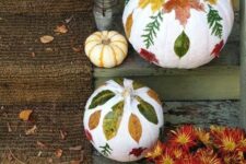 34 white pumpkins with fall leaf decoupage and a bronze one will decorate your steps in a stylish and chic way