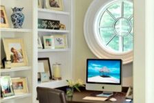 36 an awkward nook with a porthole window, built-in shelves, a built-in desk and a leather chair is a cool productive oasis