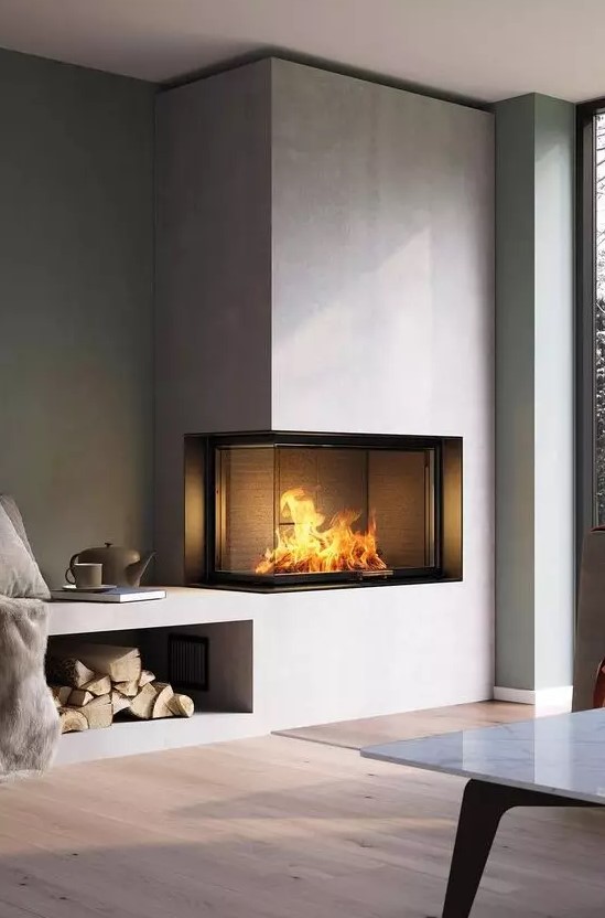 a contemporary built-in fireplace in neutrals with a glass cover and a firewood storage space is a stylish decoration