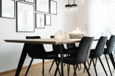a laconic Scandinavian dining room with a gallery wall, a long table, black chairs, pendant lamps is a lovely space to have meals