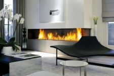 a large minimalist built-in fireplace in the living room is a stylish and bold idea with a modern feel