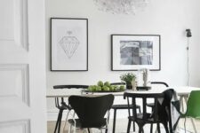 A dining space with a mini gallery wall