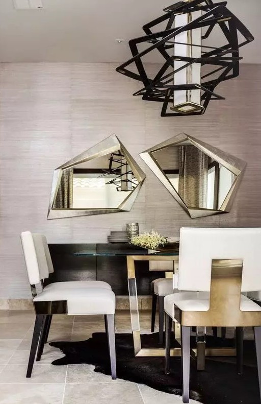a super elegant and refined dining room with taupe grasscloth wallpaper, a sleek black credenza, a lovely table and creamy and gold chairs, a geo chandelier