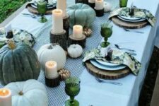 green heirloom pumpkins, green glasses and colorful floral print napkins dot the table with touches of color