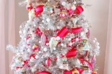 03 a bold and fun Christmas tree in silver, with hot pink and red ribbons, snowy pompom ribbons, colorful ornaments and ice cream ones