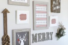 06 a cool Christmas gallery wall with various signs and rtworks, antlers, a wooden arrow and some letters is awesome