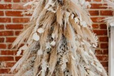 07 a creative boho Christmas tree of pampas grass and snowy branches, petals and ribbons and matching mantel decor